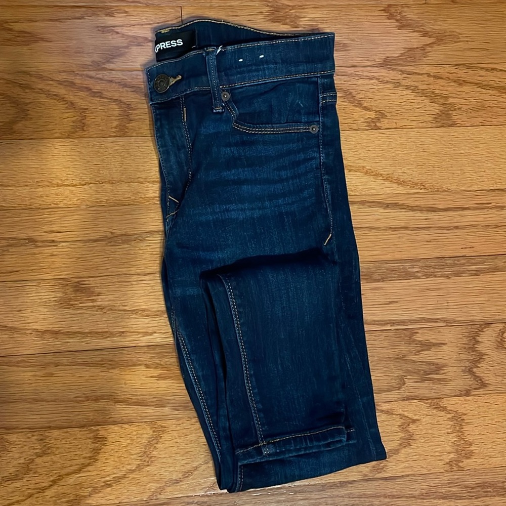 Express dark wash skinny jeans